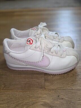 Nike Women's White Sneakers with Pink Accents